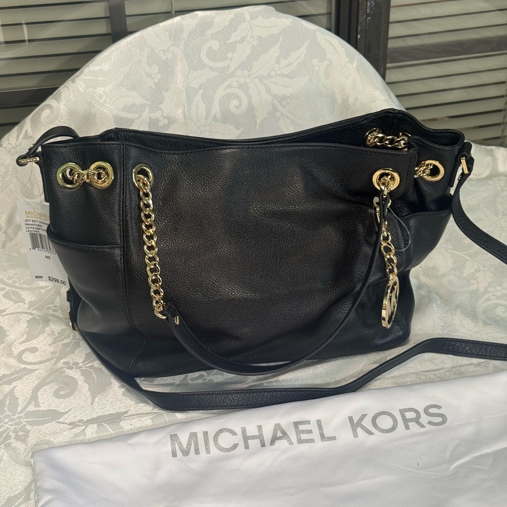 Black NWT Michael Kors handbag.